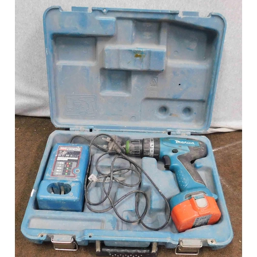 511 - Makita battery drill and charger W/O