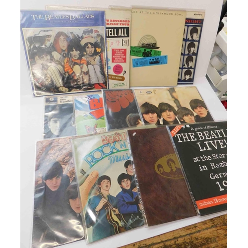 56 - Twelve - The Beatles albums/33rpm records...