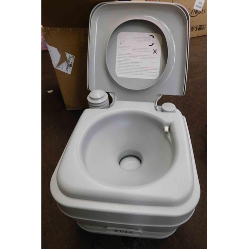 518 - New and unused portable toilet