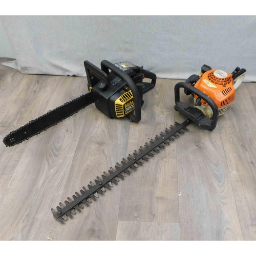 521 - Stihl hedge cutter and Mac chainsaw - both unchecked