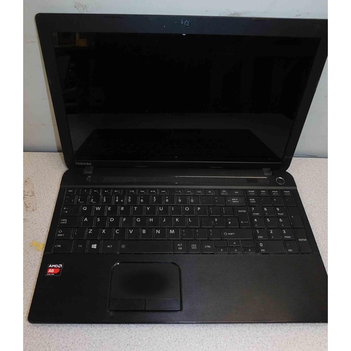 675A - Toshiba Satelite laptop - no chargers - unchecked