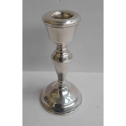 104 - Sterling silver hallmarked - weighted candle stick - maker B&Co