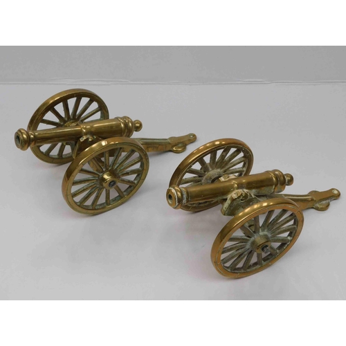 114 - Two - brass desk cannons