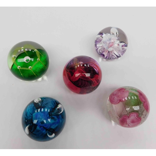 253 - Five - glass paperweights - including Caithness