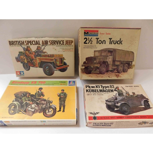 68 - Four - military model kits - including Tamiya - unchecked