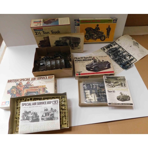 68 - Four - military model kits - including Tamiya - unchecked