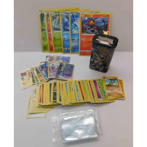 196 - Pokémon cards - tin/sleeves & giant cards