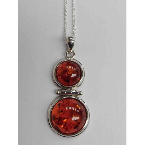 208 - Silver & amber pendant on silver chain