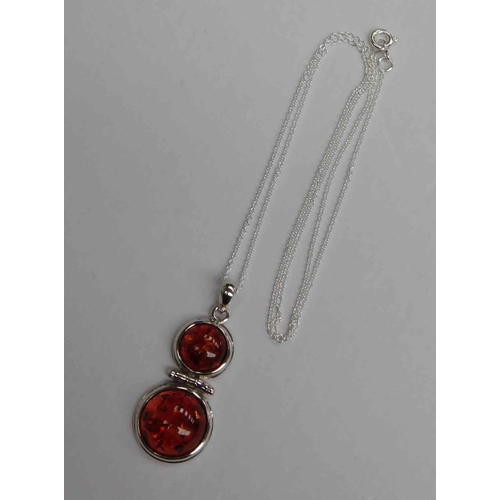 208 - Silver & amber pendant on silver chain