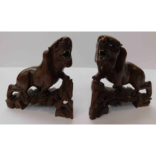 238 - Two - hardwood/oriental tigers - with bone eyes & teeth