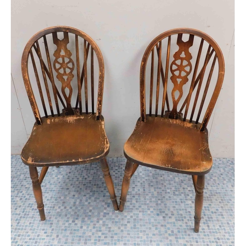 541 - Pair of oak wheelback dining chairs