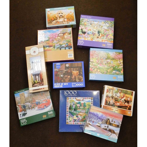 803 - Collection of jigsaw puzzles, some completed-all complete