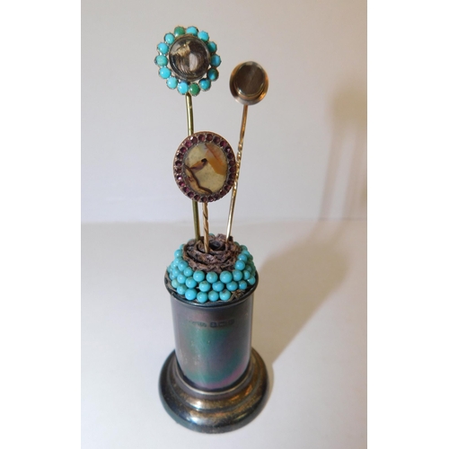 102 - Ten - Antique hat pins - set with semi precious stones/hair & gold - in sterling silver pin holder