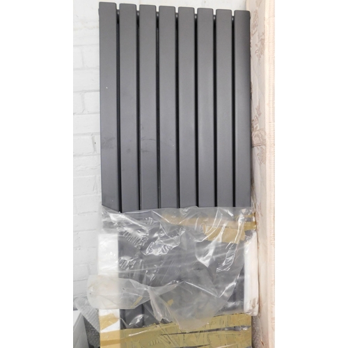 537 - Upright cast iron radiator - new, approx. 73