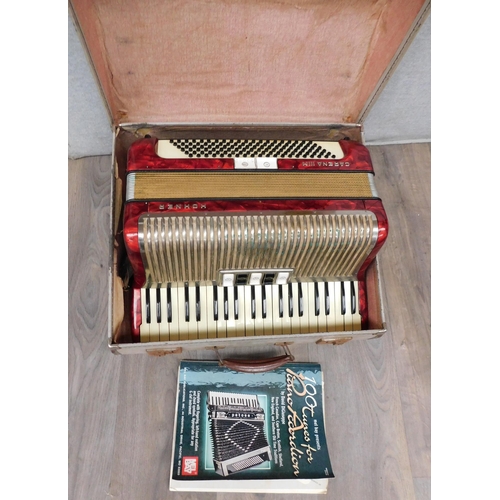 655 - Hohner Carena IIIM accordion & song book with case