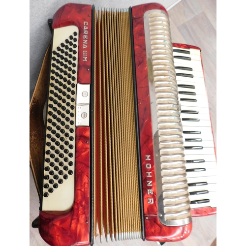 655 - Hohner Carena IIIM accordion & song book with case