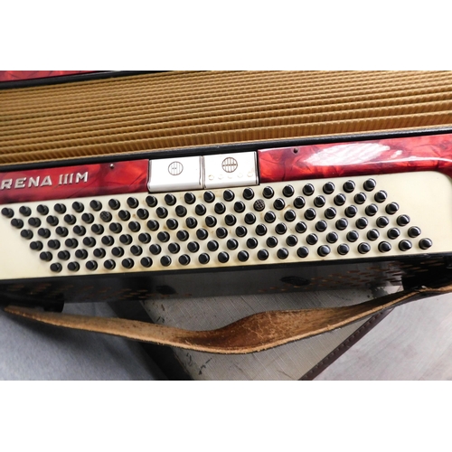 655 - Hohner Carena IIIM accordion & song book with case