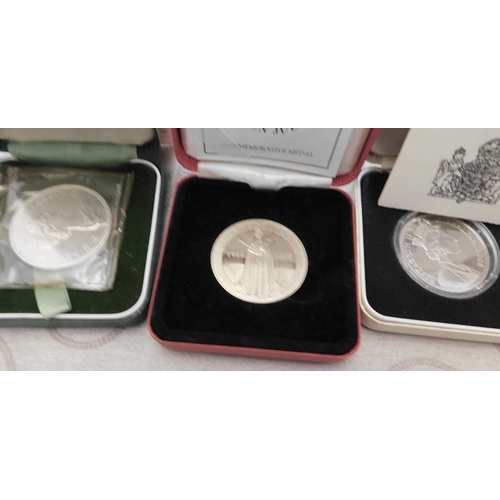 51 - Cased coins & medals