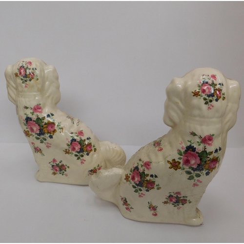 101 - Pair of Staffordshire pottery dogs/floral detail - no damage approx. 12