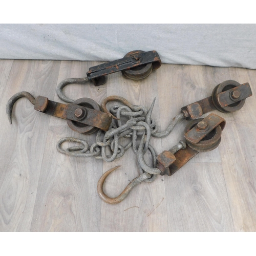 502 - Selection of vintage pulleys and chains etc.