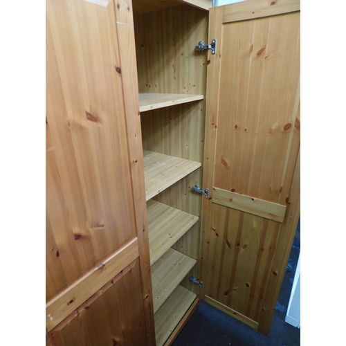 562 - Triple pine wardrobe-double hanging space & single shelves (back panel damaged)