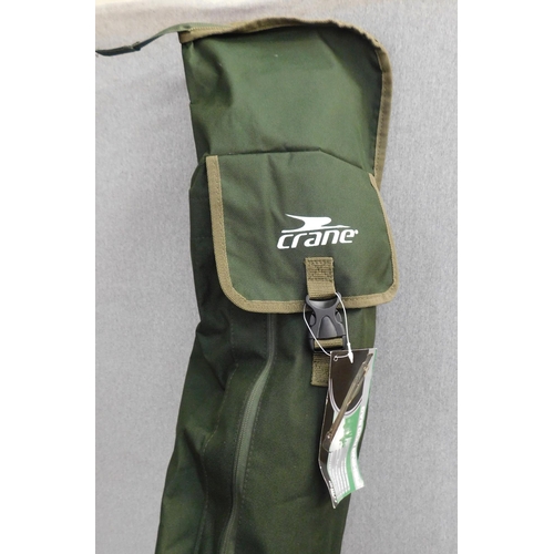 681 - Crane Convas bag containing new twin set carp rods, reels and a double rod rest