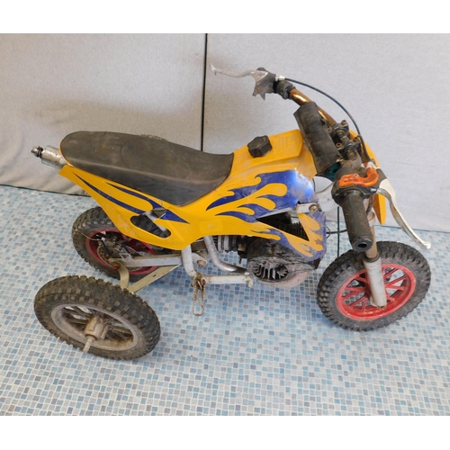 806 - Child's motorbike with stabilisers-unchecked