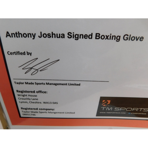 92 - Cased - signed Boxing glove/by Anthony Joshua - with COA