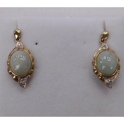 92 - 9ct Gold - Diamond & Opal set earrings