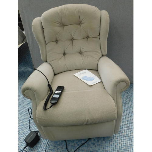 553 - Celebrity Okin rise and recline armchair in W/O