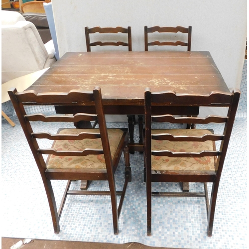 559 - Oak table and 4 chairs