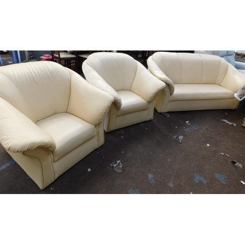 824 - Dark cream coloured leather settee + 2x matching armchairs...