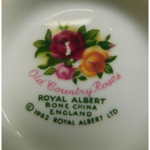 89 - Royal Albert/Country Rose pattern ceramics - including seven trios & cake plate