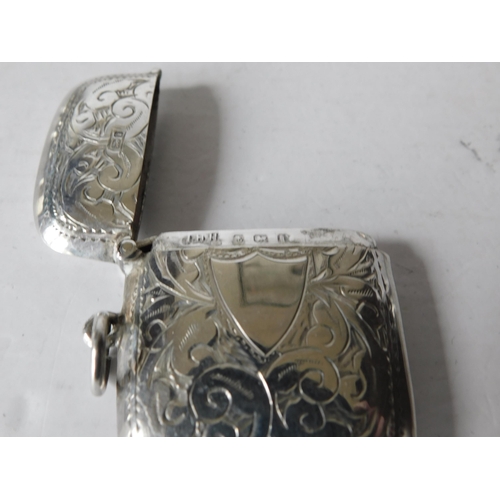 26 - Silver vesta case decorated with foliage. Birmingham 1908