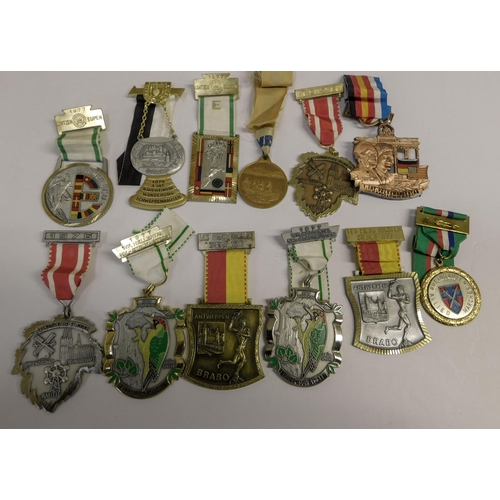 43 - Twelve - Vintage/mixed medals - including enamelled & European examples