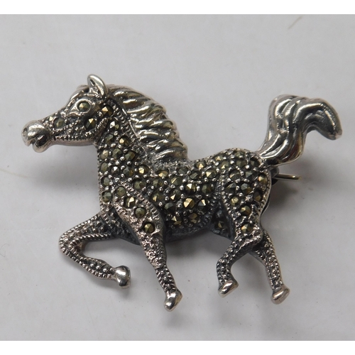 145 - Silver - marcasite set/horse brooch