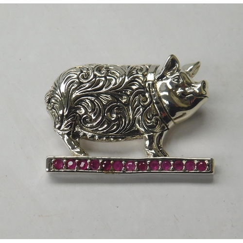 148 - Silver - red stone set/pig brooch