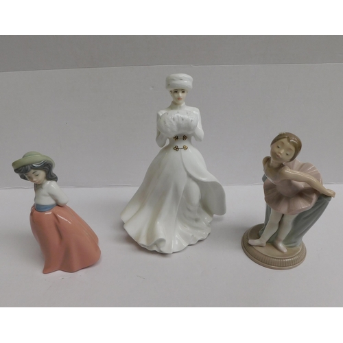 234 - Royal Doulton - A Winters morn Ltd edition 8639/15000 signed - & two Nao figures - no damage