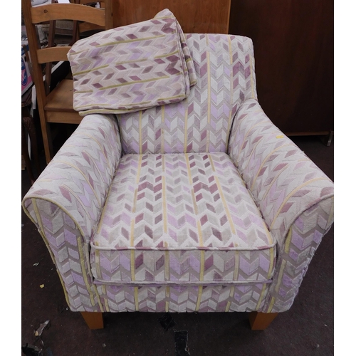 559 - Patterned armchair with matching cushion covers