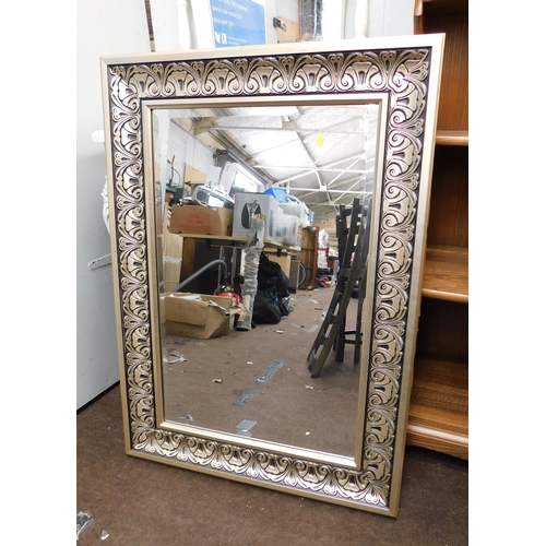 566 - Large ornate bevel edge framed mirror