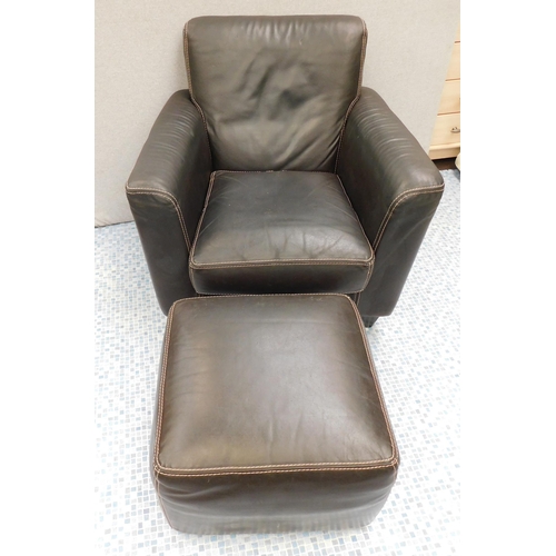 578 - Leather chair and footstool