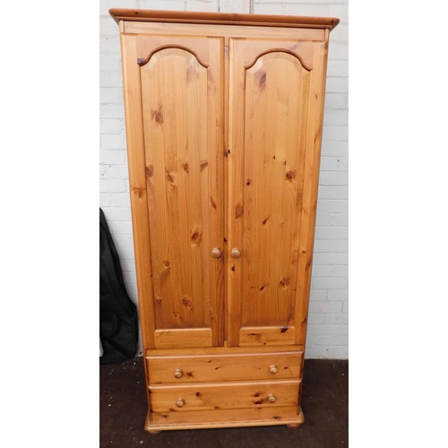 540 - Double fronted solid pine wardrobe with drawers