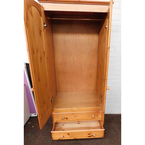 540 - Double fronted solid pine wardrobe with drawers