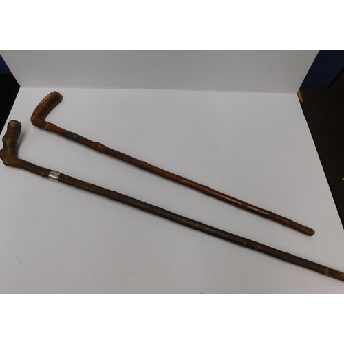 93 - Two - Vintage walking sticks with silver cuffs