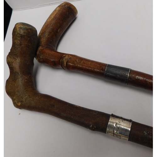 93 - Two - Vintage walking sticks with silver cuffs