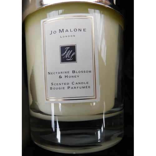 746 - 2 New and boxed Jo Malone candles - nectarine blossom and honey