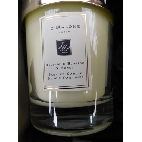 752 - 2 New and boxed Jo Malone candles - nectarine blossom and honey