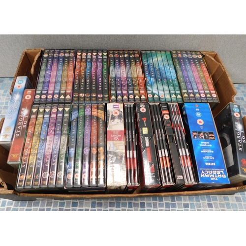 820 - Box of DVDs - mainly Stargate