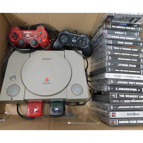 821 - Sony PlayStation 1 with accessories and games W/O