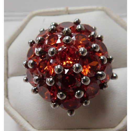 120 - Silver cluster ring - set with orange stones - size M